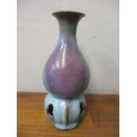 A Chinese pottery turquoise and purple bottle vase on a pierced base 8.5cm h