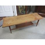 A mid 20th century retro teak two tier coffee table, possibly by Richard Hornby, 35cm h x 120cm w