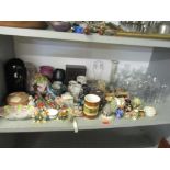 A mixed lot of ceramics and glassware to include a Poole dolphin, a Goebel cat and other items