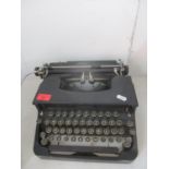 A vintage 'Silent' typewriter in black, no case