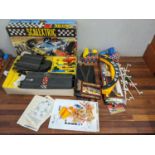 A Scalextric set 40, a C700 Dunlop Bridge and accessories Location: 2.3