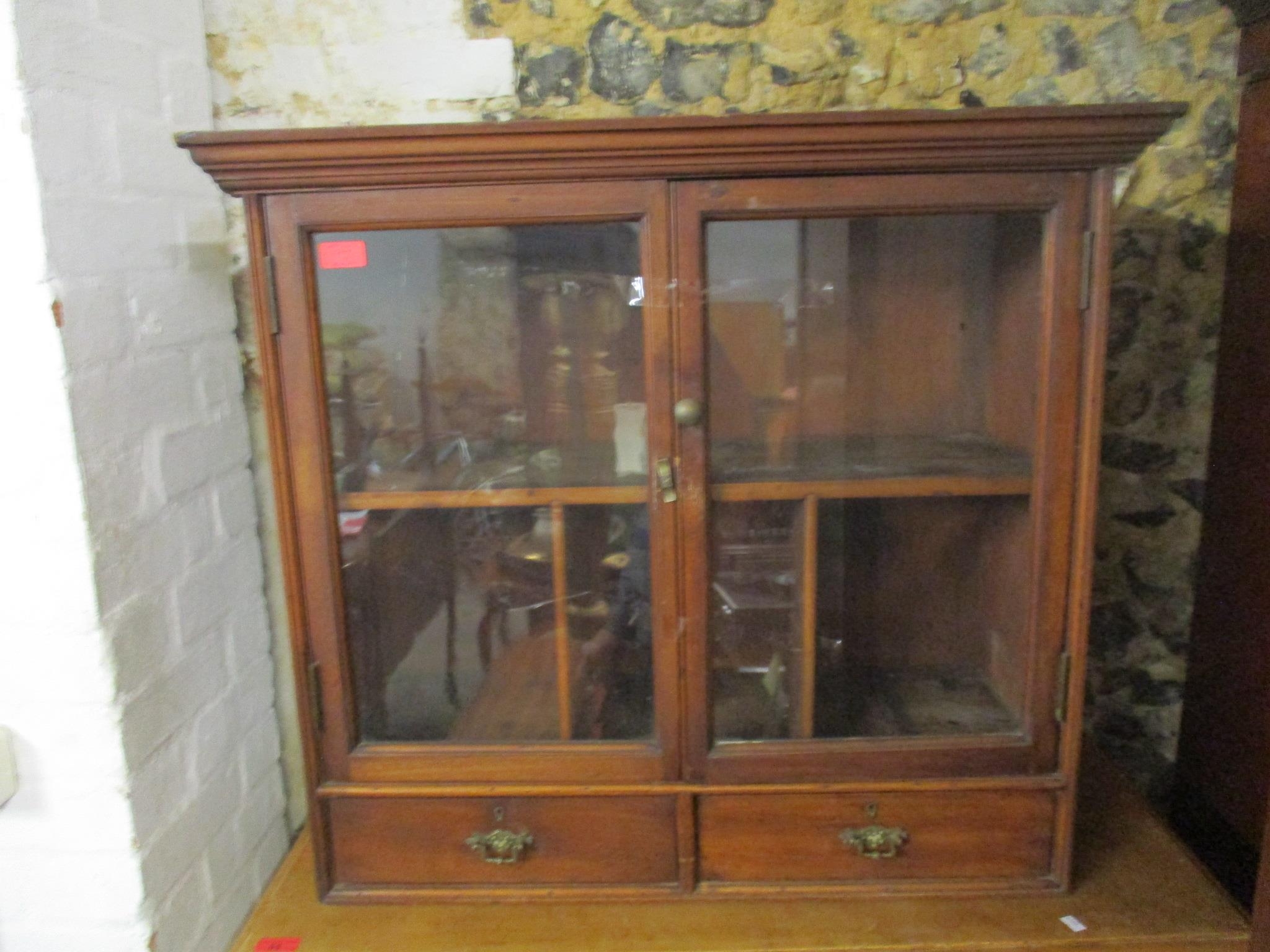 A Victorian mahogany cabinet top, twin glazed doors with a shelf and pigeon ole interior over two