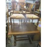 An early 20th century oak dining table, 75cm h x 106cm w, together with four dining chairs