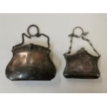 A late 19th/early 20th century silver purse, together with a smaller white metal example Location: