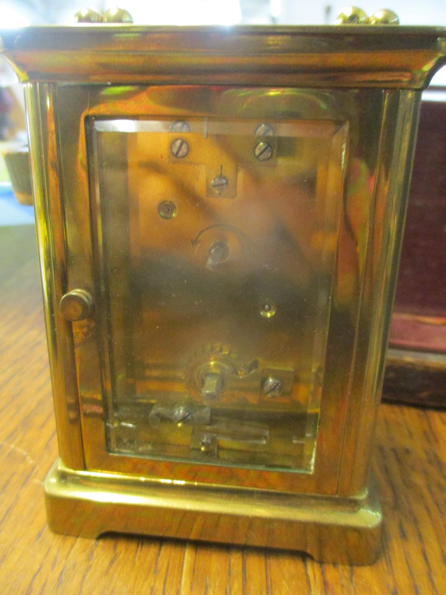 A late 19th/early 20th century carriage clock in a fitted travelling case, clock measures 14cm - Image 4 of 4