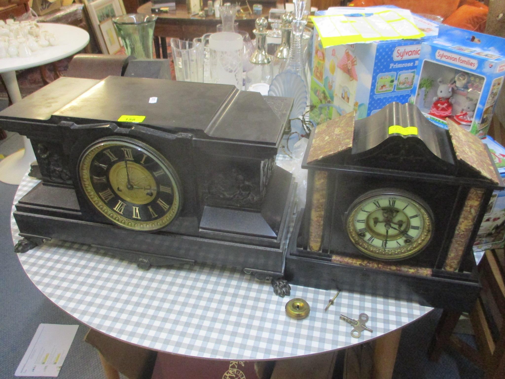 A late 19th century marble cased American Ansonia mantel clock having an enamel dial with Roman