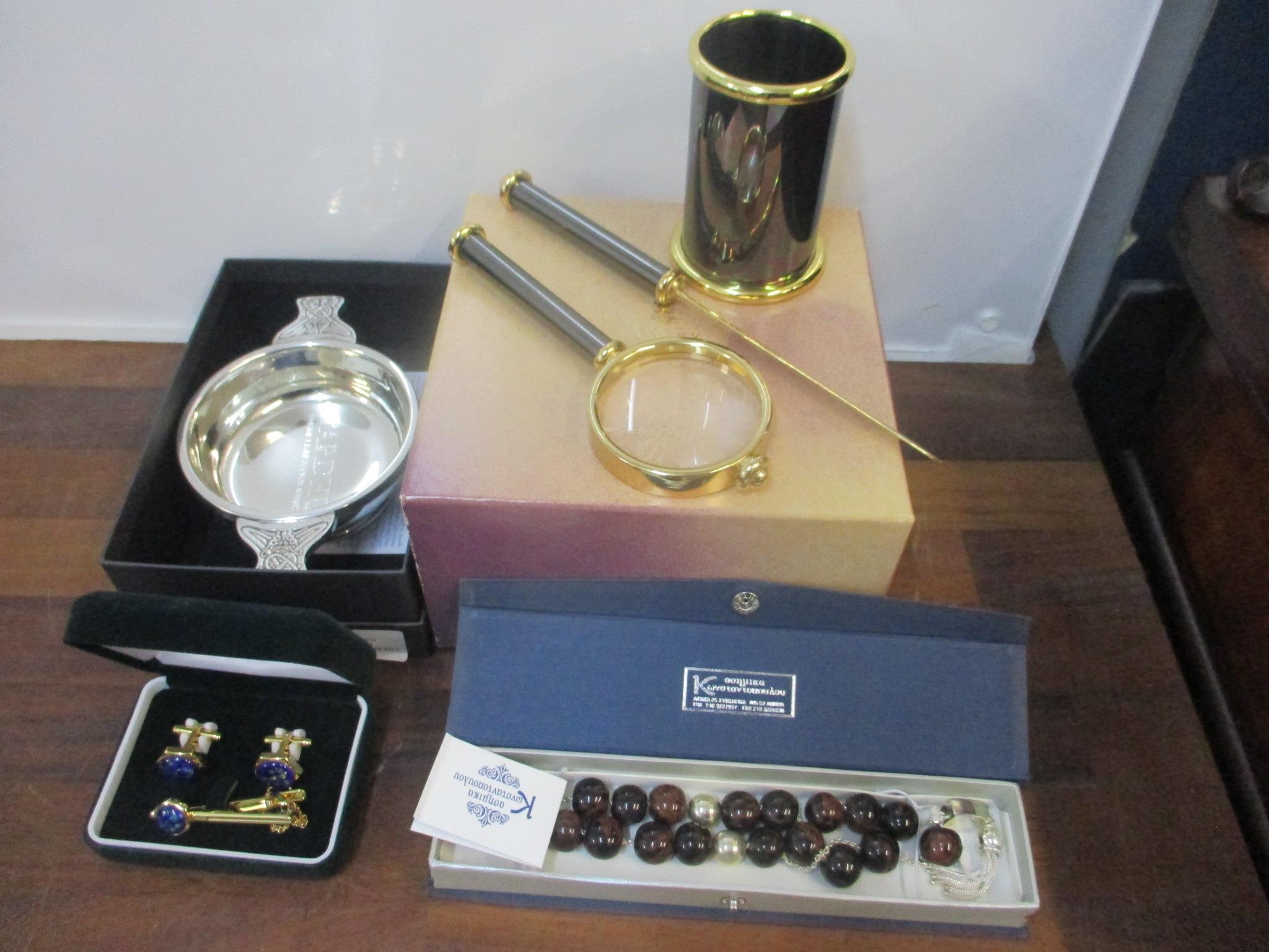 Collectables to include an Asprey desk set, a Scotch wine taster, a Greek Komboloi with silver and