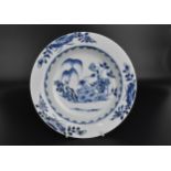 A Chinese 18th century blue and white Nanking cargo soup plate in the Willow pattern, from the wreck