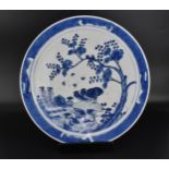 An 18th century Chinese export blue and white porcelain charger, in the Nanking style, with