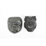Two Japanese Meiji period patinated bronze Noh masks modelled as Shoki and an Oni (demon), both