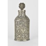 An early 20th century Persian white metal clad glass bottle with a tapered neck, the covering