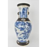 A large Chinese Quin dynasty Nanjing blue and white crackle glazed vase with a continuous river