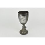 A Chinese export silver goblet modelled with a dolphin stem on a circular base, the dolphin with