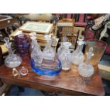 Eight crystal decanters, together with two Kosta Boda scent bottles A/F, an Art Glass jug and two