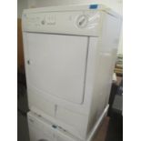 A Zanussi dryer 84cm h x 60cm w