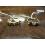 A 9ct yellow gold diamond and ruby seven-stone ring, and a 9ct gold and platinum set white and