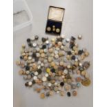 A large collection of early 20th century collar studs to include silver, yellow metal and carved