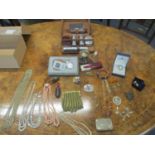 A mixed lot of jewellery, silver and other items to include a silver cigarette case, charm bracelet,