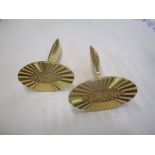 A pair of yellow metal cufflinks, tested as 18ct, 8.9g