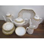 A selection of Spode Fleur de Lys pattern china to include a teapot, coffee pot and others