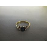 An 18ct yellow gold sapphire and diamond ring, total weight 2.2g