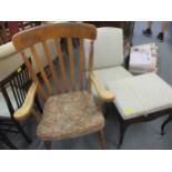 An elm and beech lathe back Windsor chair together with an early 20th century nursing chair and a
