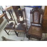 A pair of 1930's oak chairs upholstered in cow hide and an early 20th century oak framed chair