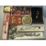 A mixed lot of mainly costume jewellery to include a cameo brooch, coral necklace, silver