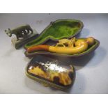 A late 19th century Meerschaum carved pipe in a case together with a tortoise shell box and a