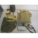 A mixed lot to include a British Army white parade belt a US field protective mask M9A1 bag, leather