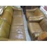 A mid century retro leather suite by Vatne Mobler consisting of a three seater sofa and two