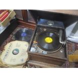 A Columbia oak cased table top gramophone along with 78 records