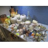 A mixed lot to include a 19th century wine bottle, mixed Royal Doulton items, bisque dolls heads,