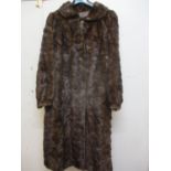 A Saga Scandinavian brown mink coat, purchased from Greece in the 1980's, 40" chest x 42" long, with