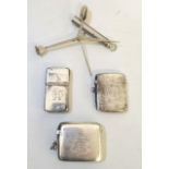 A group of three Victorian silver vesta cases having engraved motifs together with a Victorian