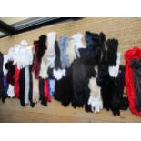 A large quantity of ladies gloves to include Dents, together with vintage scarves to include Ken
