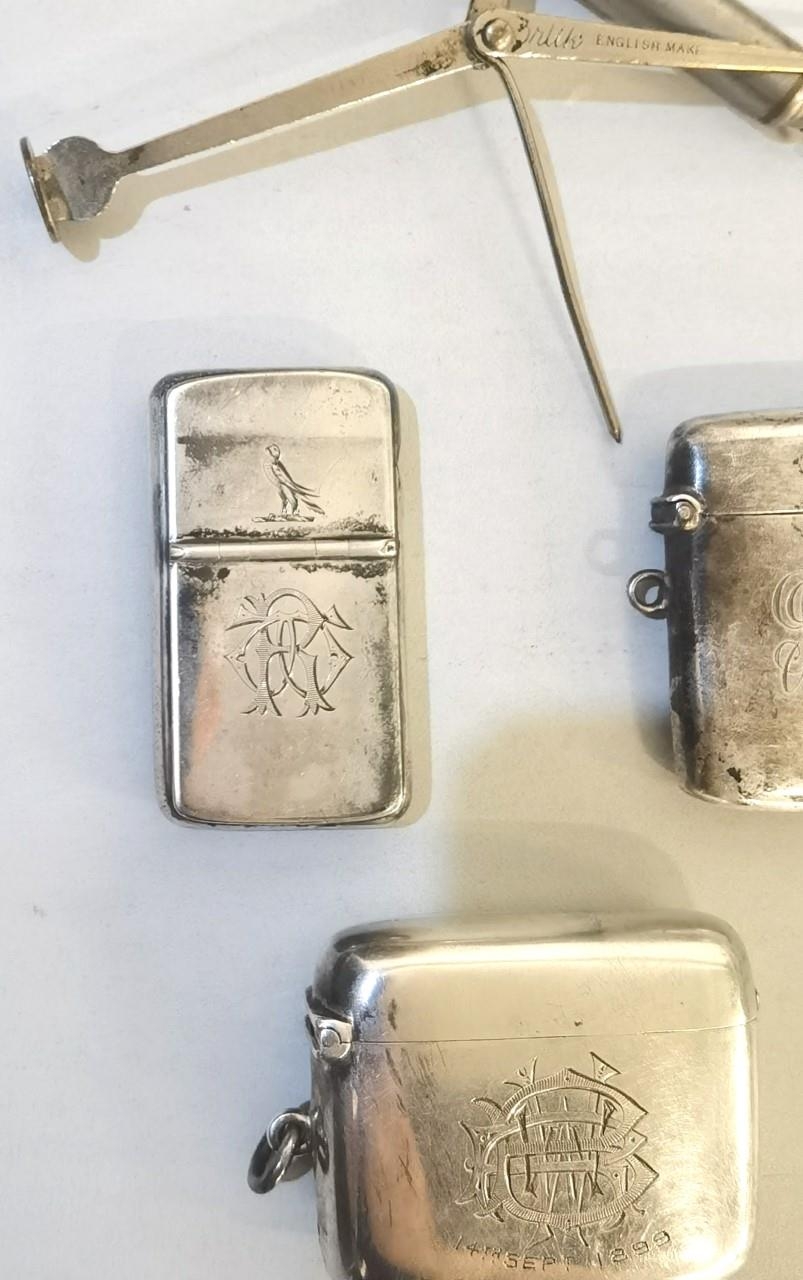 A group of three Victorian silver vesta cases having engraved motifs together with a Victorian - Image 3 of 3