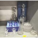 Glassware to include a Waterford decanter boxed, a pair of decanters, candlesticks and other items
