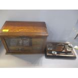A late 19th/early 20th century oak twin handles stationery box together with an inkstand