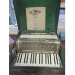 A Geraldo piano accordion in a case
