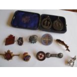 Vintage enamelled brooches and two rifle club pendants, together with a WVS civil defence pin badge,