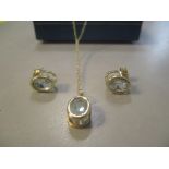 A 9ct gold aquamarine set necklace together with a pair of matching earrings