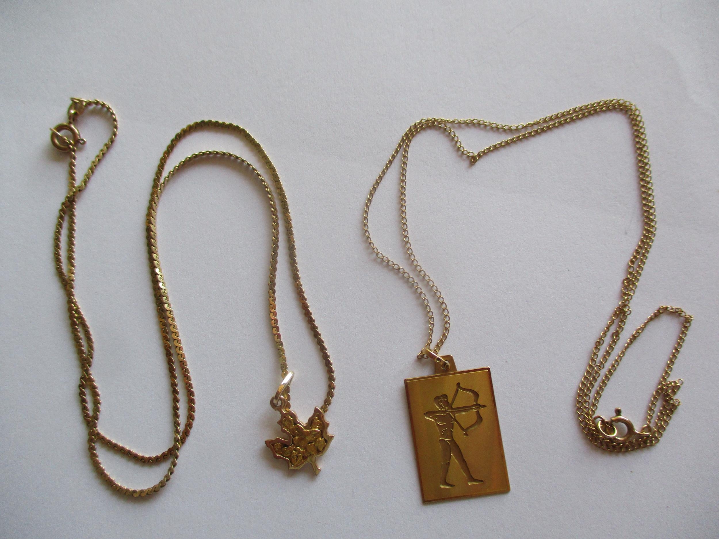 A 14ct gold necklace with 14ct gold pendant in the form of a Canadian maple leaf, 5.2g, together - Image 2 of 3