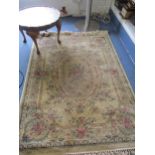 A Flemish Beluchi silk rug, 120 x 170cm together with a low pie crust walnut occasional table and an