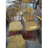 An 18th century oak drop leaf table and a later set of beech framed Windsor chairs Location: A1