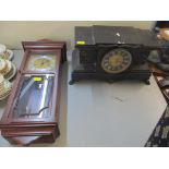 A Victorian Samuel Marti black slate mantel clock the gilt and black Roman dial with twin winding