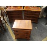 A pair of reproduction yew wood chests of drawers, 74 h x 74cm w, together with a matching smaller