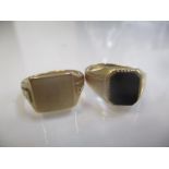 Two 9ct gold gents signet rings, one set with a black tablet, 8.8g