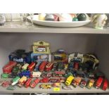 A group of diecast model vehicles to include a Dinky red cross military van