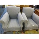 A pair of early 20th century mahogany armchairs on carved paw feet Location: LAF